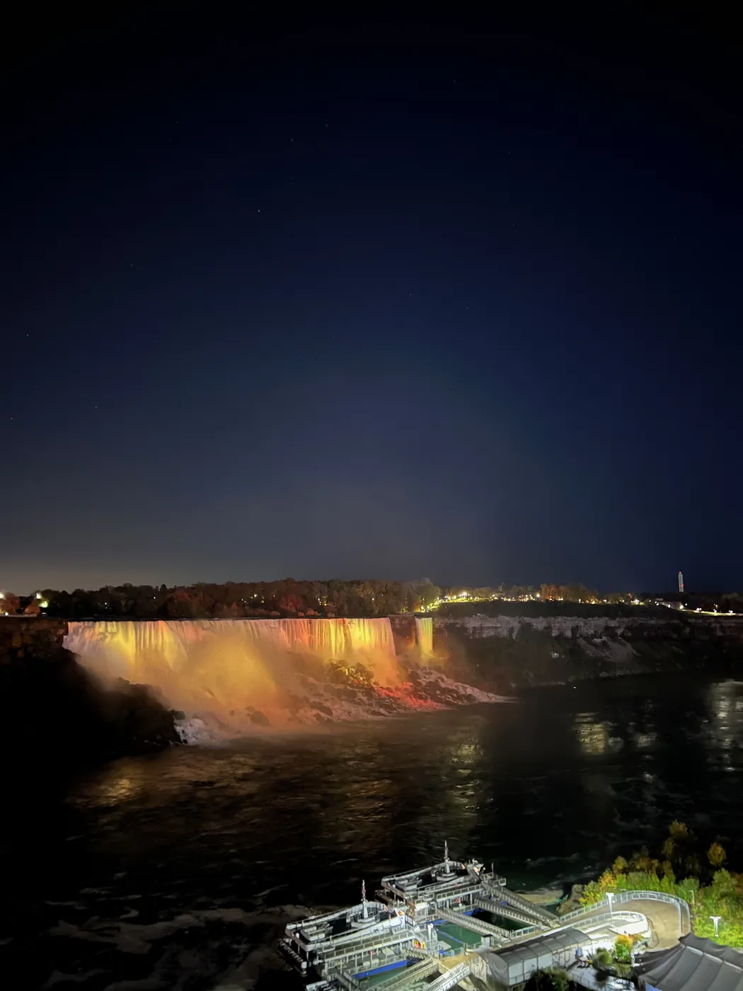 Niagara Falls lit up at night, seen from the Canadian side